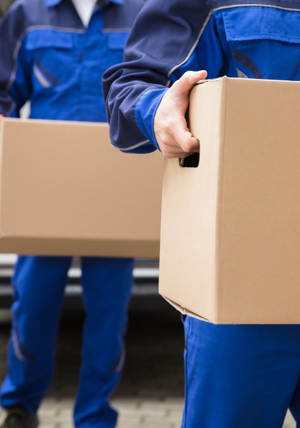 Movers Lifting Boxes